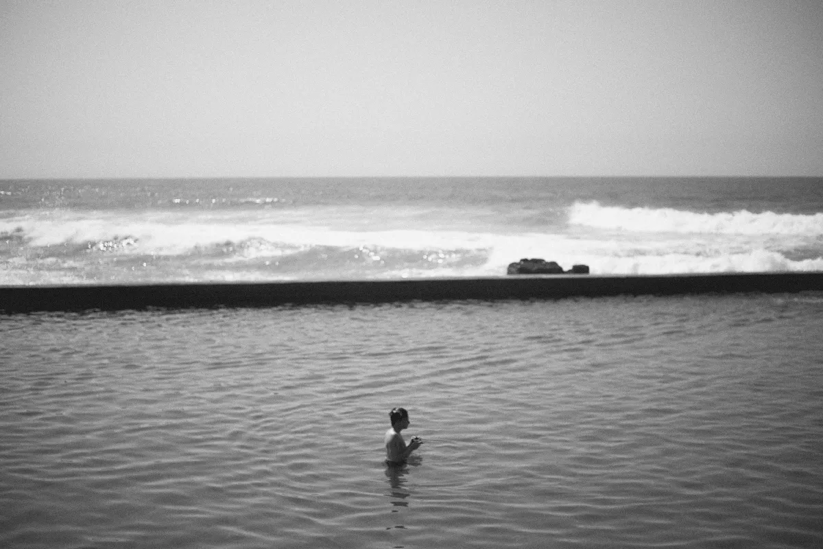 2022-09-22 - Durban -  Person standing in tidal pool